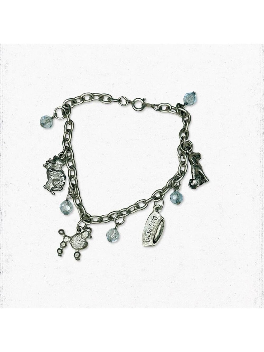 5986gc. Silvertone Faux Pearl Dog Charm Bracelet